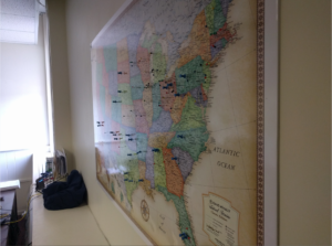 World map in our office, PracticalTek is growing!