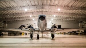 Epicor erp software for aerospace, plane in hangar